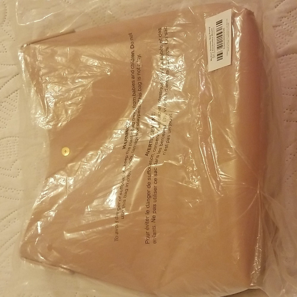 Samara brown bag new still in sealed bag